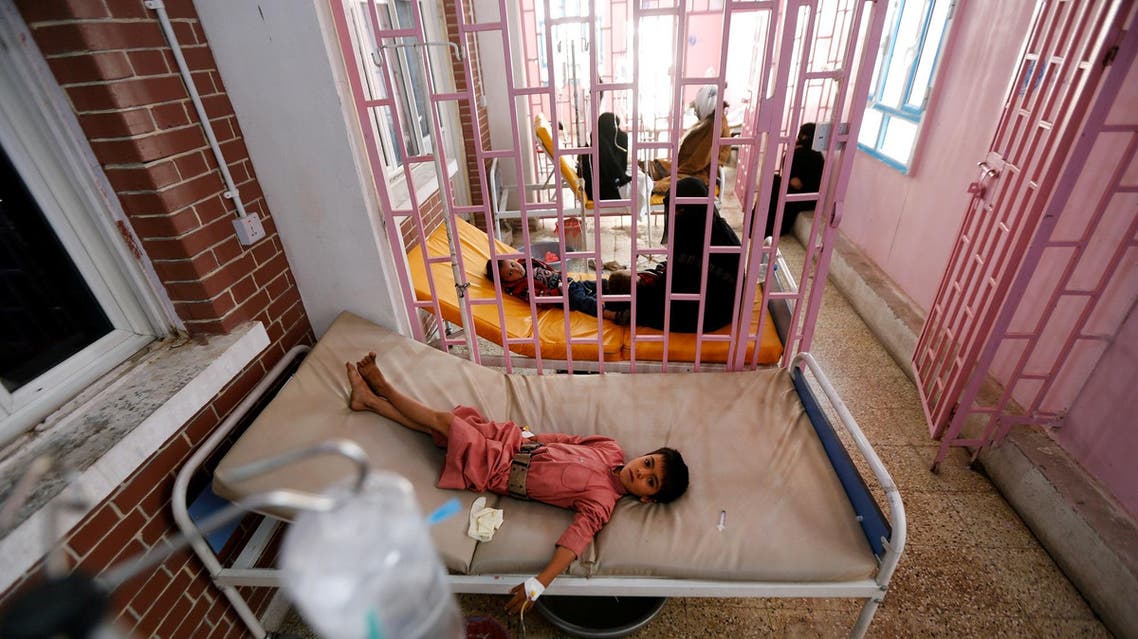 A boy lies on a bed while being treated at a cholera treatment center in Sanaa, Yemen October 8, 2017. Picture taken October 8, 2017. (Reuters)