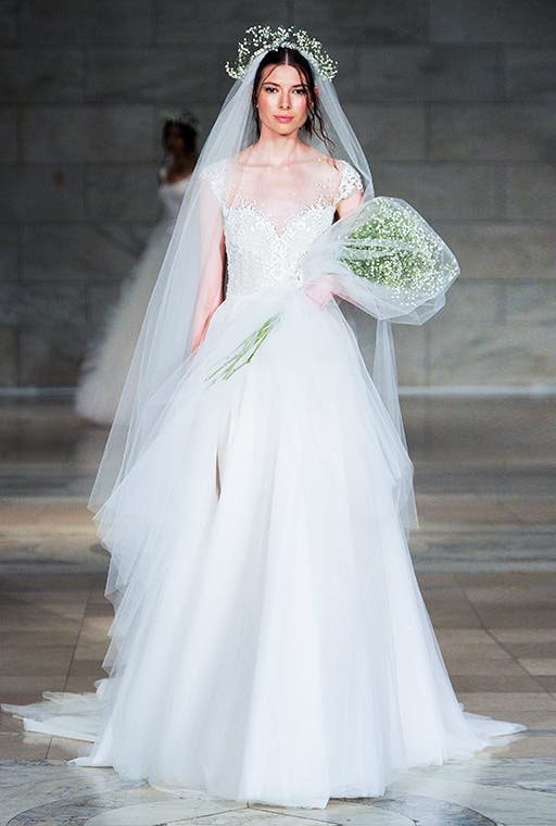 "ملكة الرومانسية" ترتدي أزياء ريم عكرا يوم زفافها 7b16bd60-f015-48d0-b245-0a922337cb95