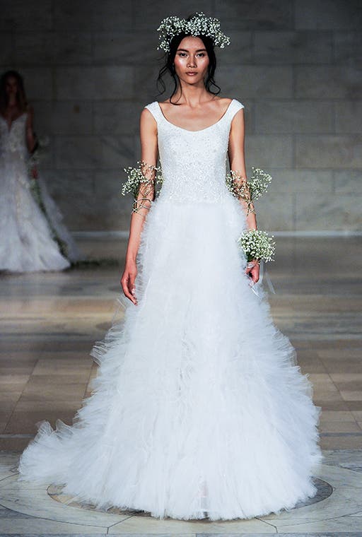 "ملكة الرومانسية" ترتدي أزياء ريم عكرا يوم زفافها 7bf6ee9b-66e8-45f6-8331-8553747e1bbb