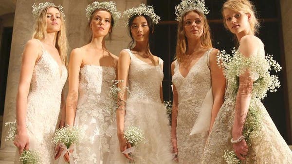 "ملكة الرومانسية" ترتدي أزياء ريم عكرا يوم زفافها 99642ce6-4f51-4a38-a69b-ac5cd0b293f4_16x9_600x338