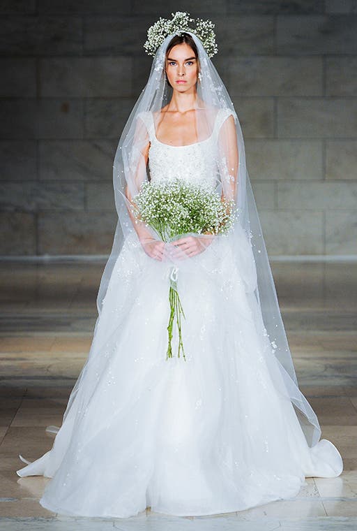 "ملكة الرومانسية" ترتدي أزياء ريم عكرا يوم زفافها Cb207f07-4565-4fda-8030-1b9ea186af56