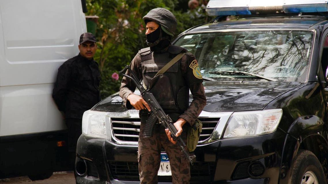 Egyptian security forces stand guard around the Coptic Catholic College of Theology and Humanities in the southern Cairo suburb of Maadi on April 29, 2017. (AFP)