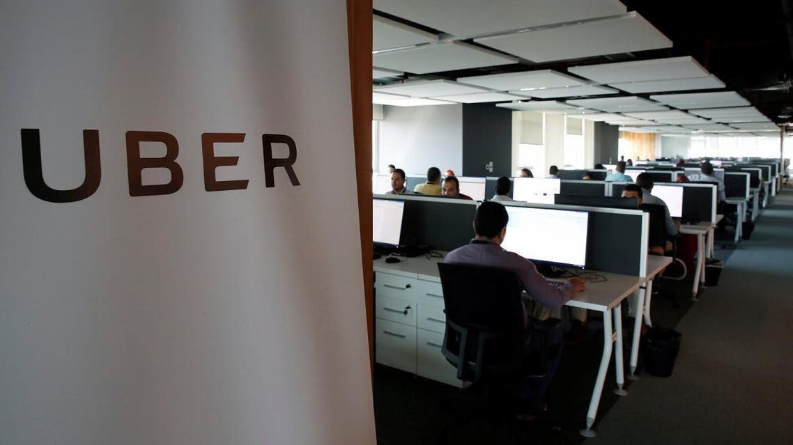 Employees work inside Uber's Centre of Excellence (COE) office in Cairo, Egypt. (Reuters)
