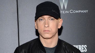 FILE - In this July 20, 2015, file photo, Eminem attends the premiere of "Southpaw" in New York. Eminem has released a verbal tirade on President Donald Trump in a video that aired as part of the BET Hip Hop Awards on Oct. 10, 2017. (Photo by Evan Agostini/Invision/AP, File)