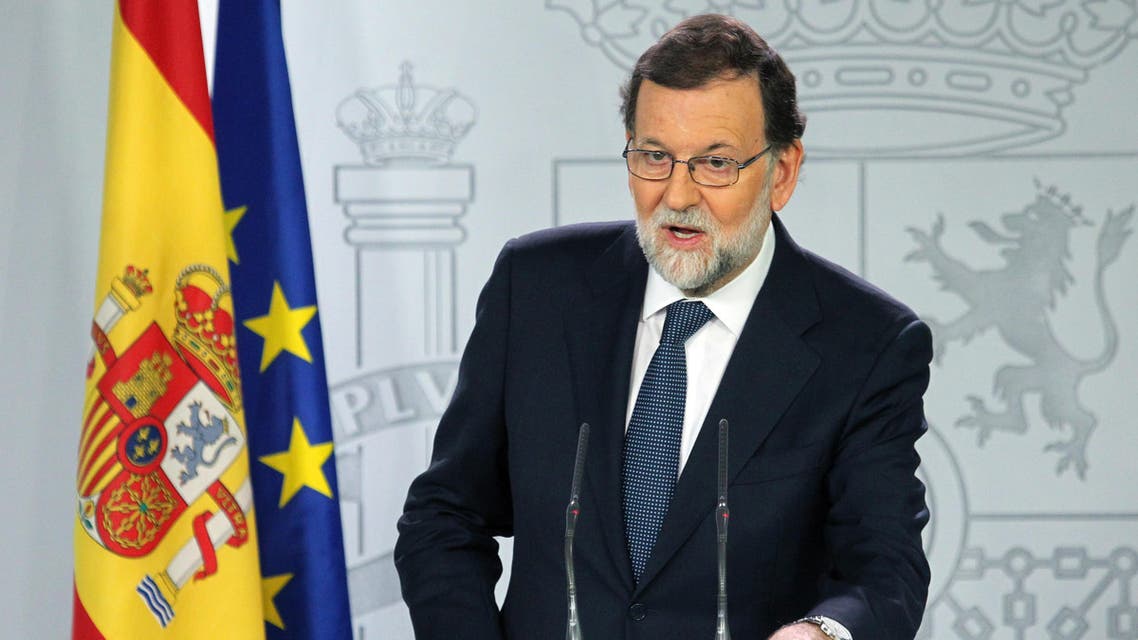 Spain's Prime Minister Mariano Rajoy gives a press conference after a crisis cabinet meeting at the Moncloa Palace on October 11, 2017 in Madrid. ap