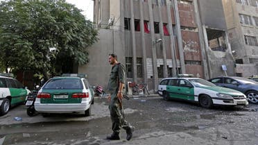 A picture shows the site of a double suicide bomb attack which hit the al-Midan police station in Syria's capital Damascus on October 2, 2017. The Syrian Observatory for Human Rights, a Britain-based monitor of the war, said at least 11 people were killed in the attack, among them six police officers. (AFP)