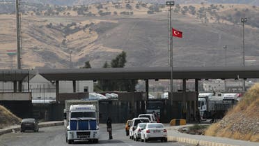Trucks are pictured after crossing the border between Iraq and Turkey as vehicles wait in line to pass Habur border gate near Silopi, Turkey, September 25, 2017. REUTERS/Umit Bektas
