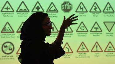 An employee of Careem talks during a training session for new female drivers at its Saudi offices in Khobar City. (AFP)