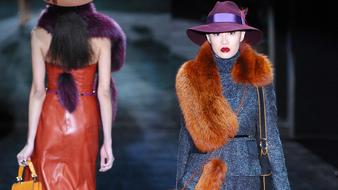 A model displays a creation as part of Gucci Fall-Winter 2011-2012 ready-to-wear collection on February 23, 2011 during the Women's fashion week in Milan. AFP PHOTO / CHRISTOPHE SIMON CHRISTOPHE SIMON / AFP