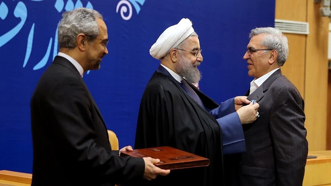 Abdolrasoul Dorri Esfahani (right) was honored by President Hassan Rohani on February 8, 2016, for his role in the landmark nuclear negotiations. (via president.ir)