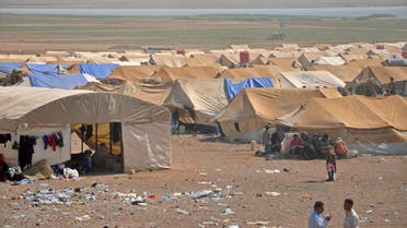 Displaced Syrians from Deir Ezzor are seen at a make-shift camp some in the province of Hasakeh on August 2017. (AFP)