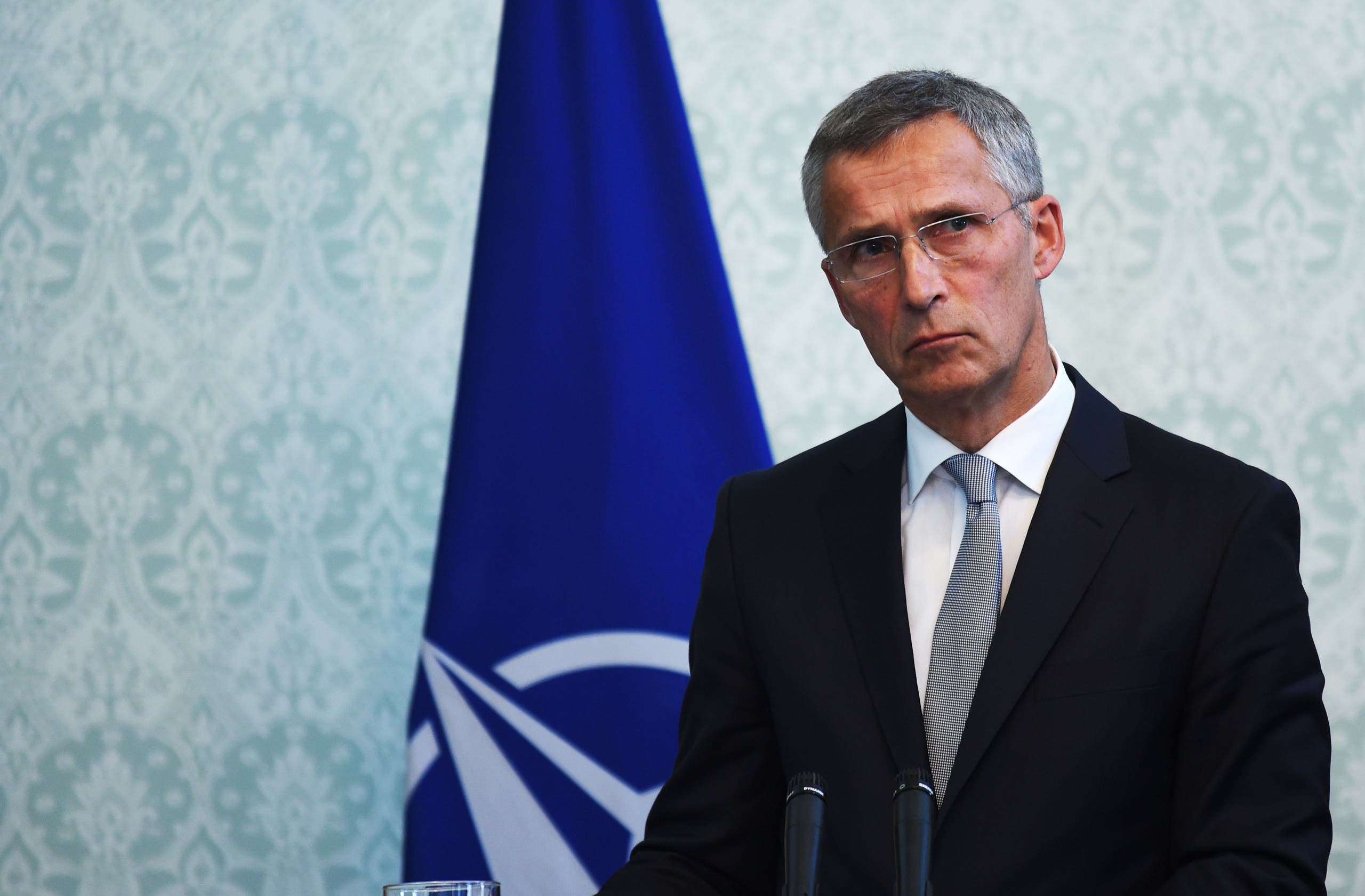 NATO chief Jens Stoltenberg looks on during a joint press conference with Afghan President Ashraf Ghani and US Defense Secretary Jim Mattis at the Presidential Palace in Kabul on September 27, 2017. US Defense Secretary Jim Mattis and NATO chief Jens Stoltenberg renewed their commitment to Afghanistan on September 27, as the Taliban launched a rocket attack that wounded five civilians in Kabul.  WAKIL KOHSAR / AFP