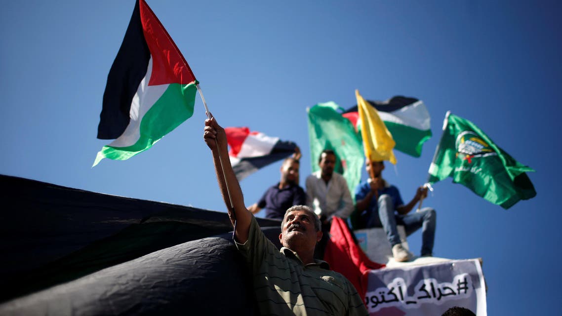 جانب من احتفالات الفلسطينيين في غزة بتوقيع اتفاق المصالحة