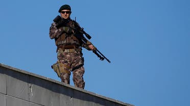 A member of police special forces stands guard during a trial for soldiers accused of attempting to assassinate Turkish President Erdogan on the night of the failed last year's July 15 coup, in Mugla. (Reuters)
