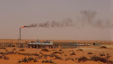 A flame from a Saudi Aramco oil installion known as Pump 3 is seen in the desert near the oil-rich area of Khouris, 160 kms east of the Saudi capital Riyadh, on June 23, 2008. (AFP)
