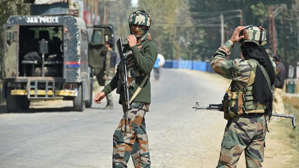 Indian paramilitary troopers stands guard after a gunfight with militants at Hajin village of Kashmir's Bandipora district, north of Srinagar, on October 11, 2017. (AFP)