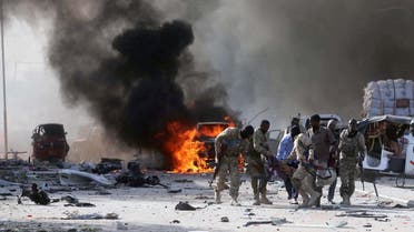 Somali Armed Forces evacuate their injured colleague, from the scene of an explosion in Mogadishu. (Reuters)