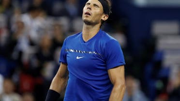 Rafael Nadal of Spain reacts during the match against Roger Federer of Switzerland. (Reuters)