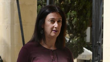 A picture taken on April 27, 2017 shows journalist and blogger Daphne Capuana Galizia arriving at the Law Court in Malta. Capuana Galizia was killed today on October 16, 2017 in a car bomb close to her home in Bidnija, Malta. The force of the blast broke her car into several pieces and catapulted the journalist's body into a nearby field, witnesses said. She leaves a husband and three sons. Caruana Galizia's death comes four months after Prime Minister Joseph Muscat's Labour Party won a resounding victory in a general election he called early as a result of scandals to which Caruana Galizia's allegations were central. (AFP)