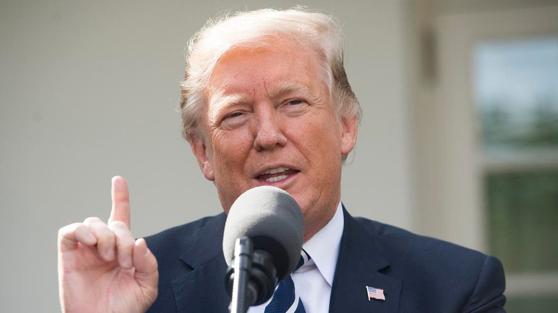 US President Donald Trump speaks to the press in the Rose Garden of the White House in Washington, DC, October 16, 2017. (AFP)