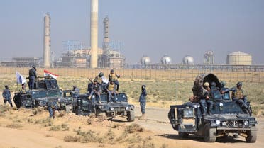 Members of Iraqi federal forces gather near oil fields in Kirkuk on October 16, 2017. (Reuters)