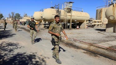 Members of Iraqi security forces are seen at an oil field in Dibis area on the outskirts of Kirkuk, Iraq October 17, 2017. REUTERS/Alaa Al-Marjani