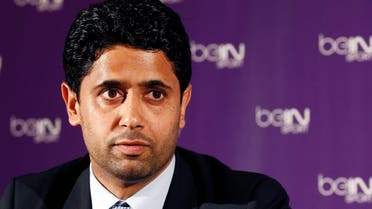 FILE PHOTO: Nasser Al-Khelaifi (L), Paris St Germain's club owner and owner of Qatari TV channel Al Jazeera Sport, President of beIN Sport French TV channel, attends a news conference in Paris May 24, 2012. Picture taken May 24, 2012. REUTERS/Jacky Naegelen/File Photo