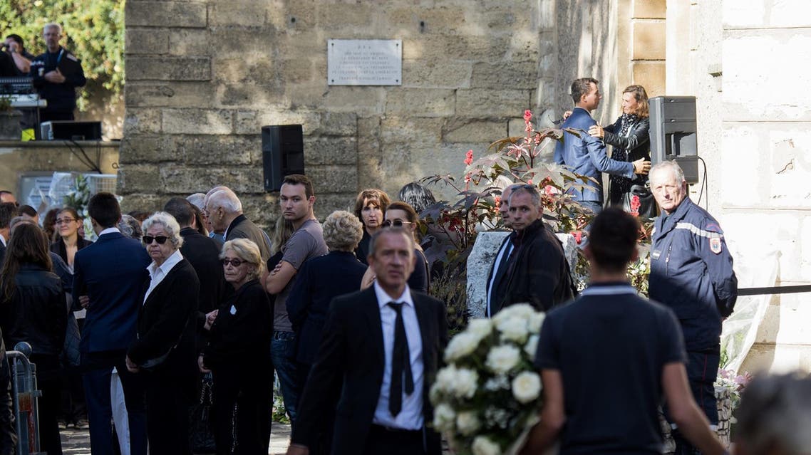 People attend the funerals of two victims of an attack in the coastal city of Marseille at the church of Eguilles. (AFP)