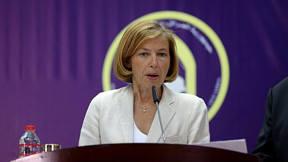 French Defence Minister Florence Parly speaks during a joint press conference with French Foreign Affairs Minister Jean-Yves Le Drian and Iraqi Foreign Minister Ibrahim al-Jaafari in Baghdad, Iraq, Saturday, Aug. 26, 2017. (AP Photo/Karim Kadim)