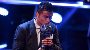 Real Madrid and Portugal forward Cristiano Ronaldo kisses the trophy after winning The Best FIFA Men's Player of 2017 Award during The Best FIFA Football Awards ceremony, on October 23, 2017 in London. (AFP)