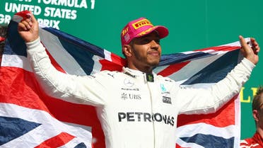 AUSTIN, TX - OCTOBER 22: Race winner Lewis Hamilton of Great Britain and Mercedes GP celebrates on the podium during the United States Formula One Grand Prix at Circuit of The Americas on October 22, 2017 in Austin, Texas. Clive Rose/Getty Images/AFP
