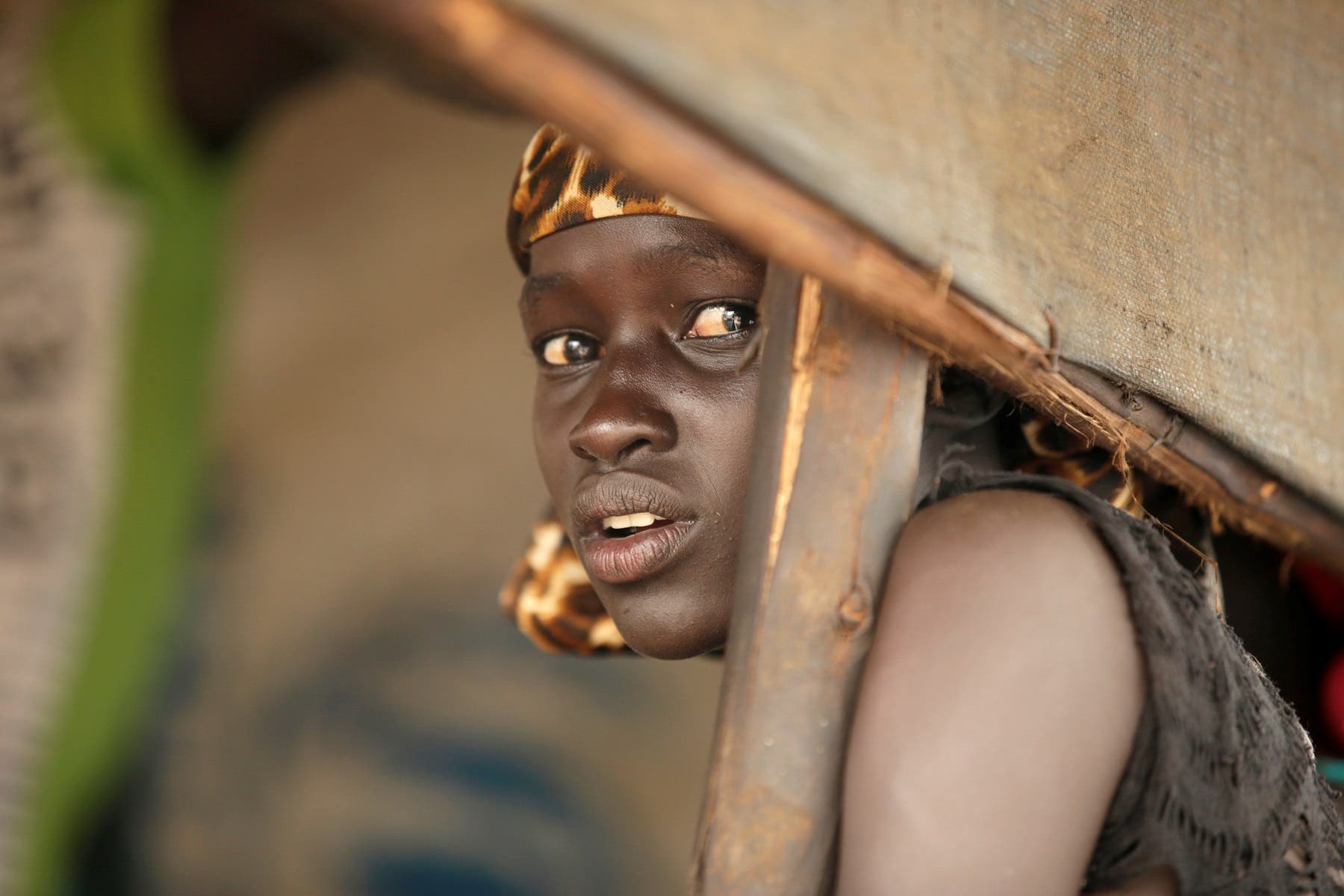 A South Sudanese refugee girl is seen at the Nguenyyiel refugee camp during a visit by US Ambassador to the United Nations Nikki Haley. (Reuters)