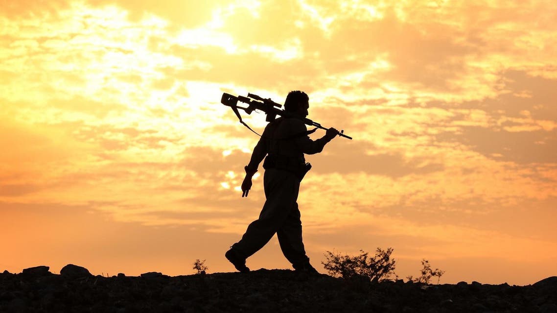 An Iranian Kurdish Peshmerga, member of the Iranian Kurdistan Democratic Party (KDP-Iran), takes part in routine military exercise in Koya, 100 kms east of Arbil, the capital of the autonomous Kurdish region of northern Iraq, on October 22, 2017. (AFP)