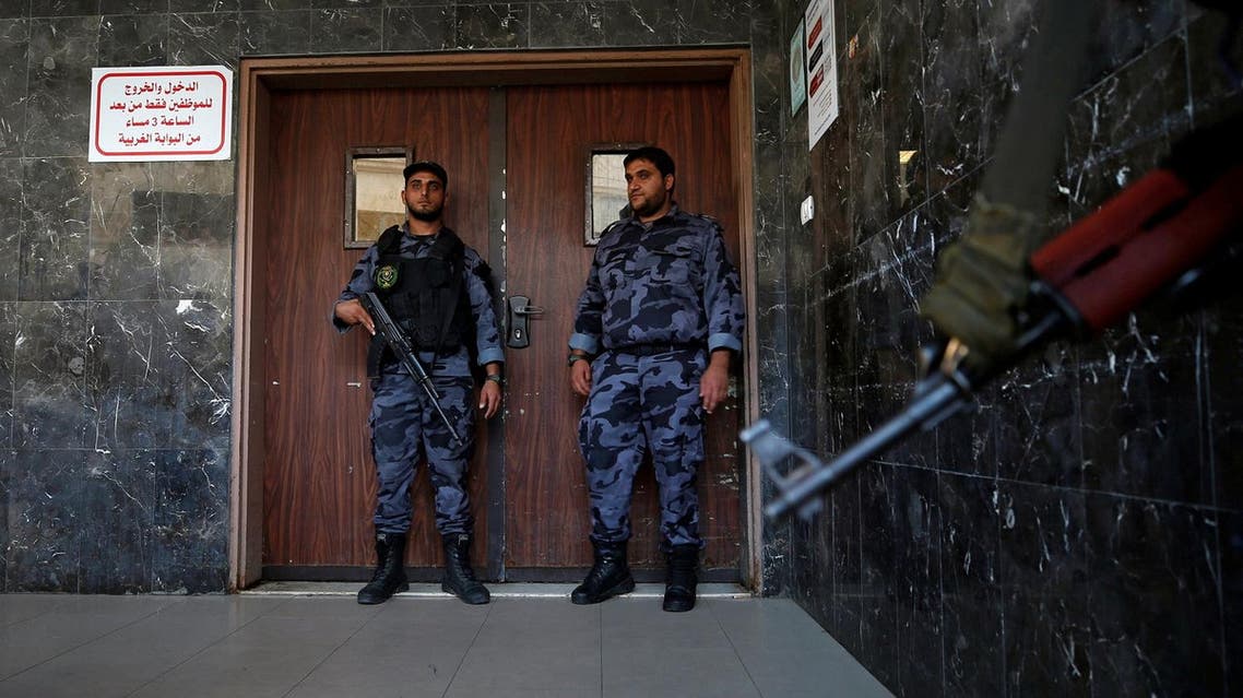 Palestinian Hamas security forces guard outside the hospital after Hamas' security chief Tawfeeq Abu Naeem was wounded in a car bombing, in Gaza City October 27, 2017. REUTERS/Mohammed Salem