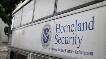 A Homeland Security Immigration and Customs Enforcement (ICE) bus is seen parked outside a federal jail in San Diego, California, U.S. October 19, 2017. REUTERS/Mike Blake