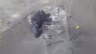 A still image taken from a video footage released by Russia's Defence Ministry on October 10, 2017, shows what the ministry said was a militants' APC, before being hit by missiles, in Deir al-Zor province