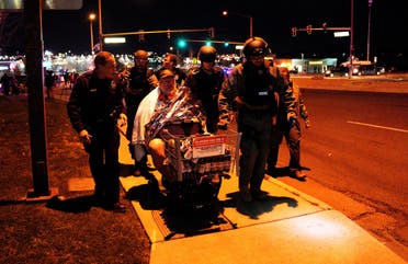 A man is evacuated in a Walmart cart by SWAT medics from the scene of shooting in Thornton, Colorado November 1, 2017. (Reuters)
