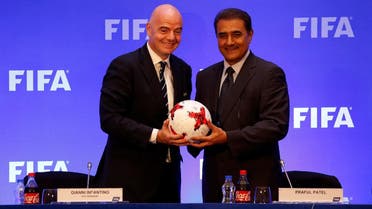 FIFA President Gianni Infantino and All India Football Federation (AIFF) President Praful Patel pose at a news conference in Kolkata, India, on October 27, 2017. (Reuters)