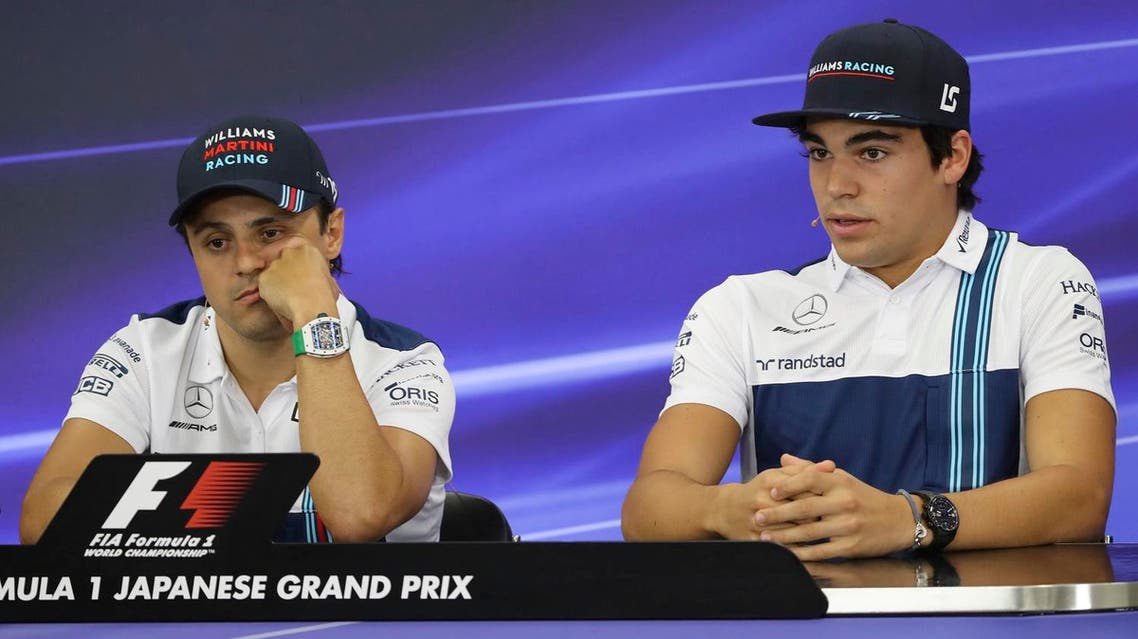 Williams driver Felipe Massa (left), of Brazil and Williams driver Lance Stroll (right), of Canada at a press conference. (AP)