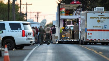 Medical personnel and law enforcement set up along a street near the First Baptist Church in Sutherland. (Reuters)
