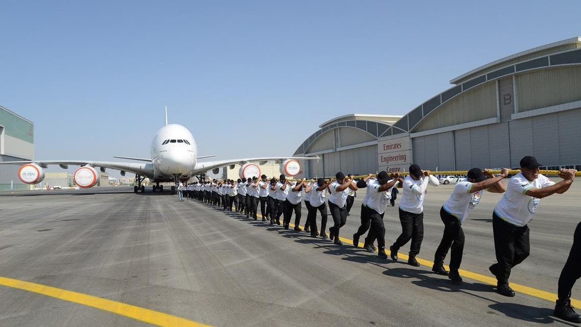 UAE policemen break world record of heaviest aircraft pulled by a team