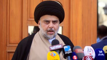 Iraqi cleric Moqtada Sadr (L) speaks during a joint press conference with Iraq's parliament speaker Salim al-Juburi in the central shrine city of Najaf on May 6, 2017, following their meeting.  Haidar HAMDANI / AFP