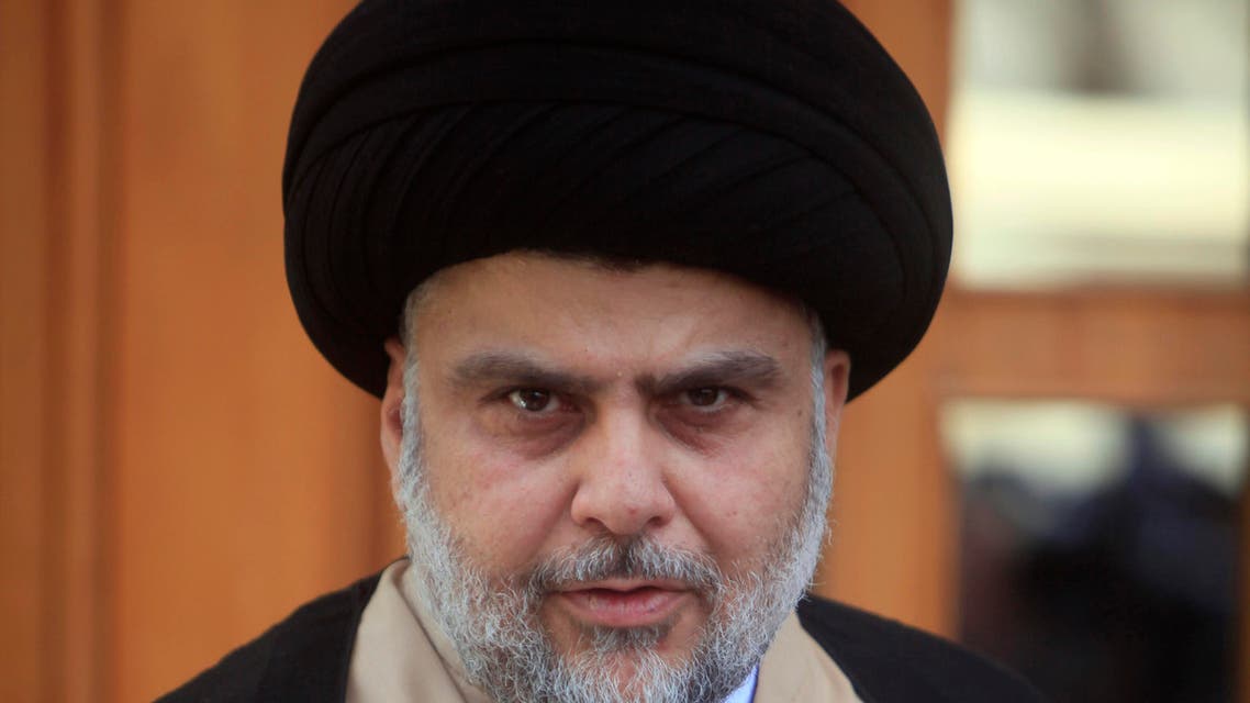 Iraqi cleric Moqtada Sadr (L) speaks during a joint press conference with Iraq's parliament speaker Salim al-Juburi in the central shrine city of Najaf on May 6, 2017, following their meeting. Haidar HAMDANI / AFP