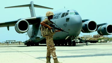 A soldier from the United Arab Emirates stands guard next to a UAE military plane at the airport of Yemen's southern port city of Aden August 8, 2015. (Reuters)