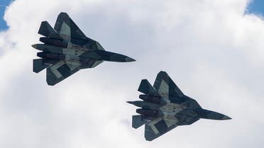 A pair of Russian SU34 military jets take part in an exhibition flight on July 18, 2017 at the annual air show MAKS 2017 in Zhukovsky, some 40 km outside Moscow. AFP
