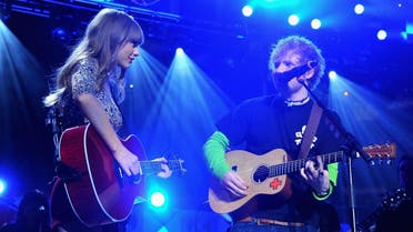 NEW YORK, NY - DECEMBER 07: Taylor Swift and Ed Sheeran perform onstage during Z100's Jingle Ball 2012, presented by Aeropostale, at Madison Square Garden on December 7, 2012 in New York City. Theo Wargo/Getty Images for Jingle Ball 2012/AFP