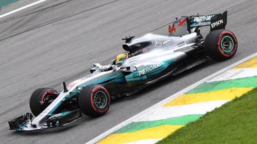 Mercedes' British driver Lewis Hamilton powers his car during the Brazilian Formula One Grand Prix Q1 qualifying session at the Interlagos circuit in Sao Paulo, Brazil, on November 11, 2017. Mercedes' Finnish driver Valtteri Bottas took pole for the Brazilian Grand Prix while teammate and newly-crowned world champion Lewis Hamilton crashed out and will start Sunday's race from the back of the grid. Ferrari pair Sebastian Vettel and Kimi Raikkonen were second and third fastest in qualifying. (AFP)