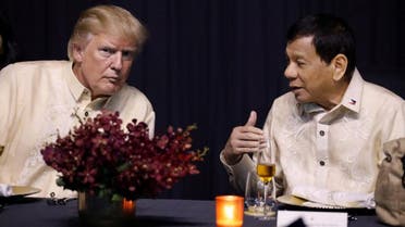 US President Donald Trump talks with Philippines President Rodrigo Duterte during the gala dinner marking ASEAN's 50th anniversary in Manila, Philippines November 12, 2017. (Reuters)