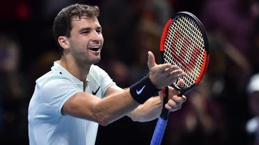 Bulgaria's Grigor Dimitrov celebrates his three set victory over Austria's Dominic Thiem during day two of the ATP World Tour Finals tennis tournament at the O2 Arena in London on November 13, 2017. (AFP)