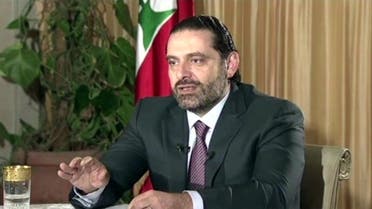 Saad Hariri said he will return “to complete the procedures for the resignation and the negotiation of a formula." (AP)